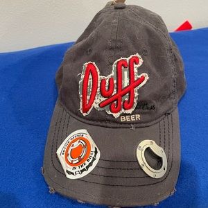 The Simpsons Duff Beer Bottle Opener Hat
Matt Groening
